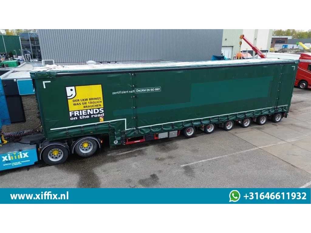 MEUSBURGER 6-ass. Semi dieplader met elektische huifopbouw // 3x naloop gestuurd