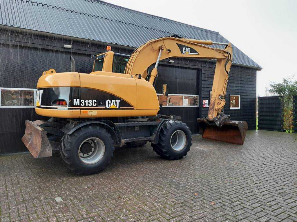 Cat M 313 C graafmachine kraan
