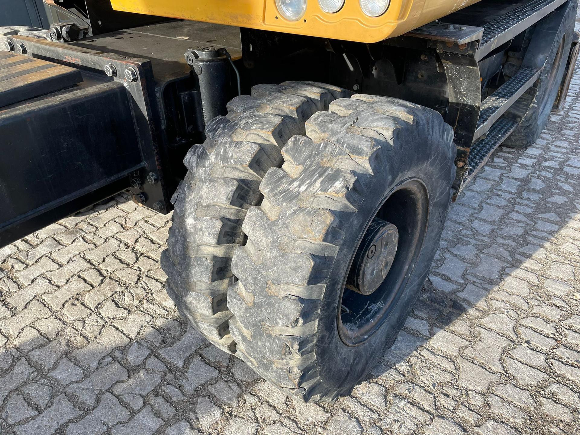 Foto 10 van Cat M314F