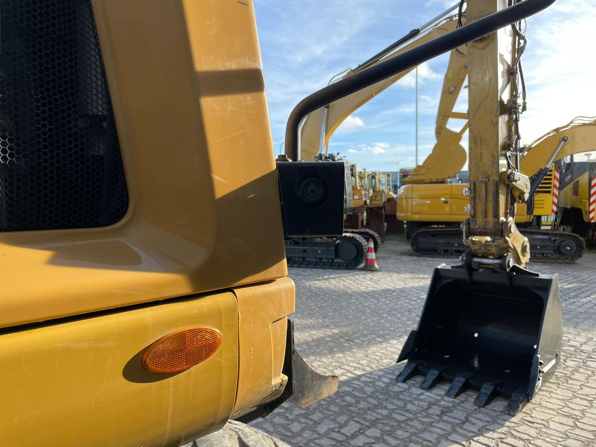 Foto 32 van Cat M314F