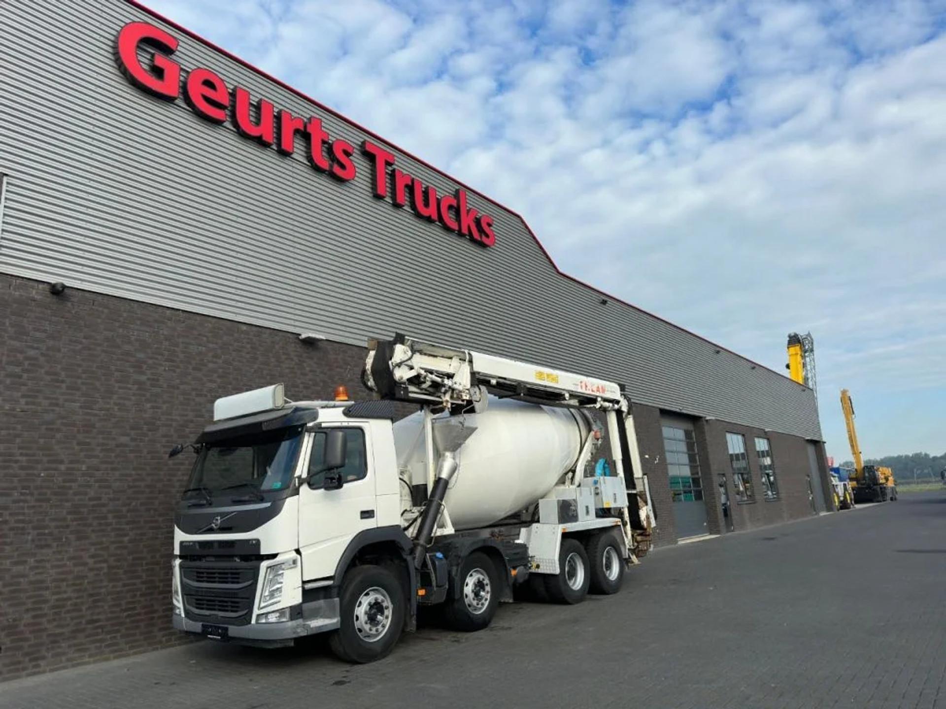 Foto 2 van Volvo FM 410 8X4 + STETTER 9 M3 MIXER/MISCHER + THEAM 15 M TRANSPORTBAND/BELT