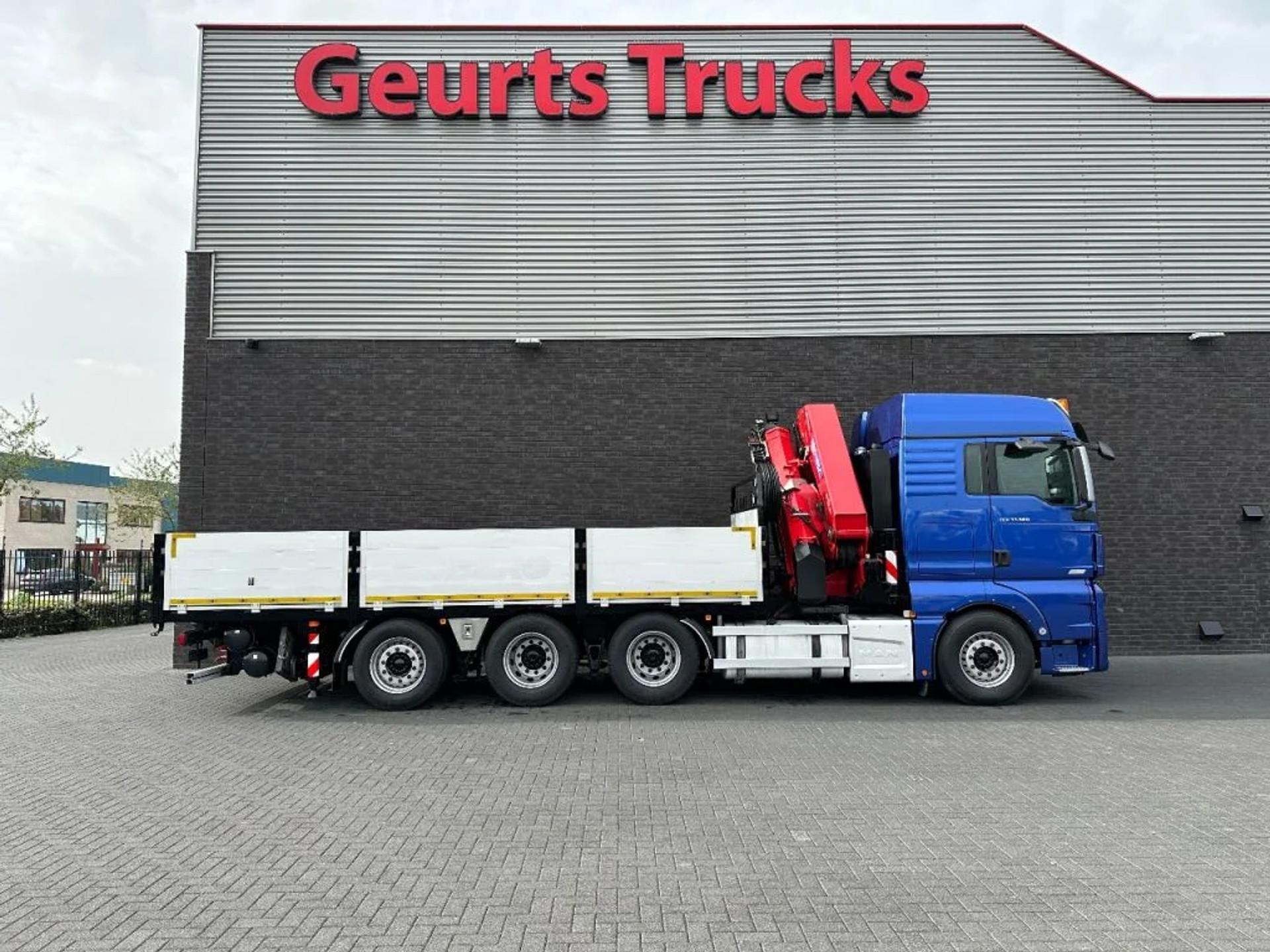 Foto 11 van MAN TGX 33.560 8X4 TRIDEM + HMF 4020-K8 KRAAN/KRAN/CRANE/GRUA