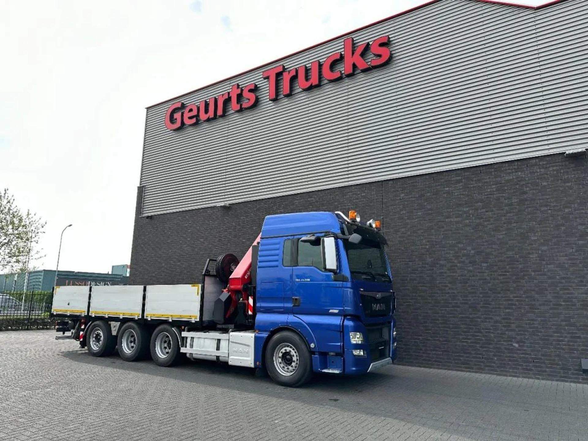 Foto 13 van MAN TGX 33.560 8X4 TRIDEM + HMF 4020-K8 KRAAN/KRAN/CRANE/GRUA