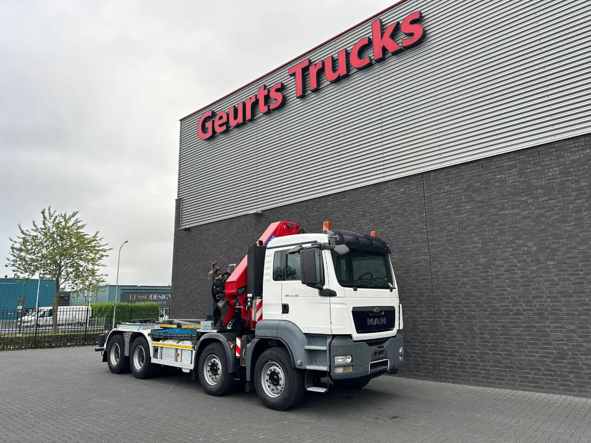 Foto 12 van MAN TGS 35.400 8X4 MET VDL S-20-5500 HAAKARMSYSTEEM + HMF 4020-K8 KRAAN/KRAN/CRANE/GRUA