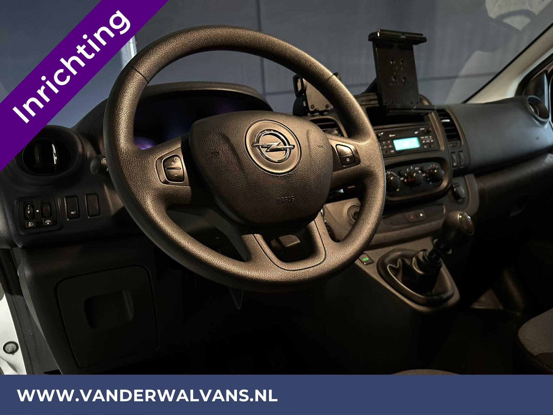 Foto 15 van Opel Vivaro 1.6 CDTI L2H1 Euro6 Airco | Imperiaal | Trekhaak | Inrichting