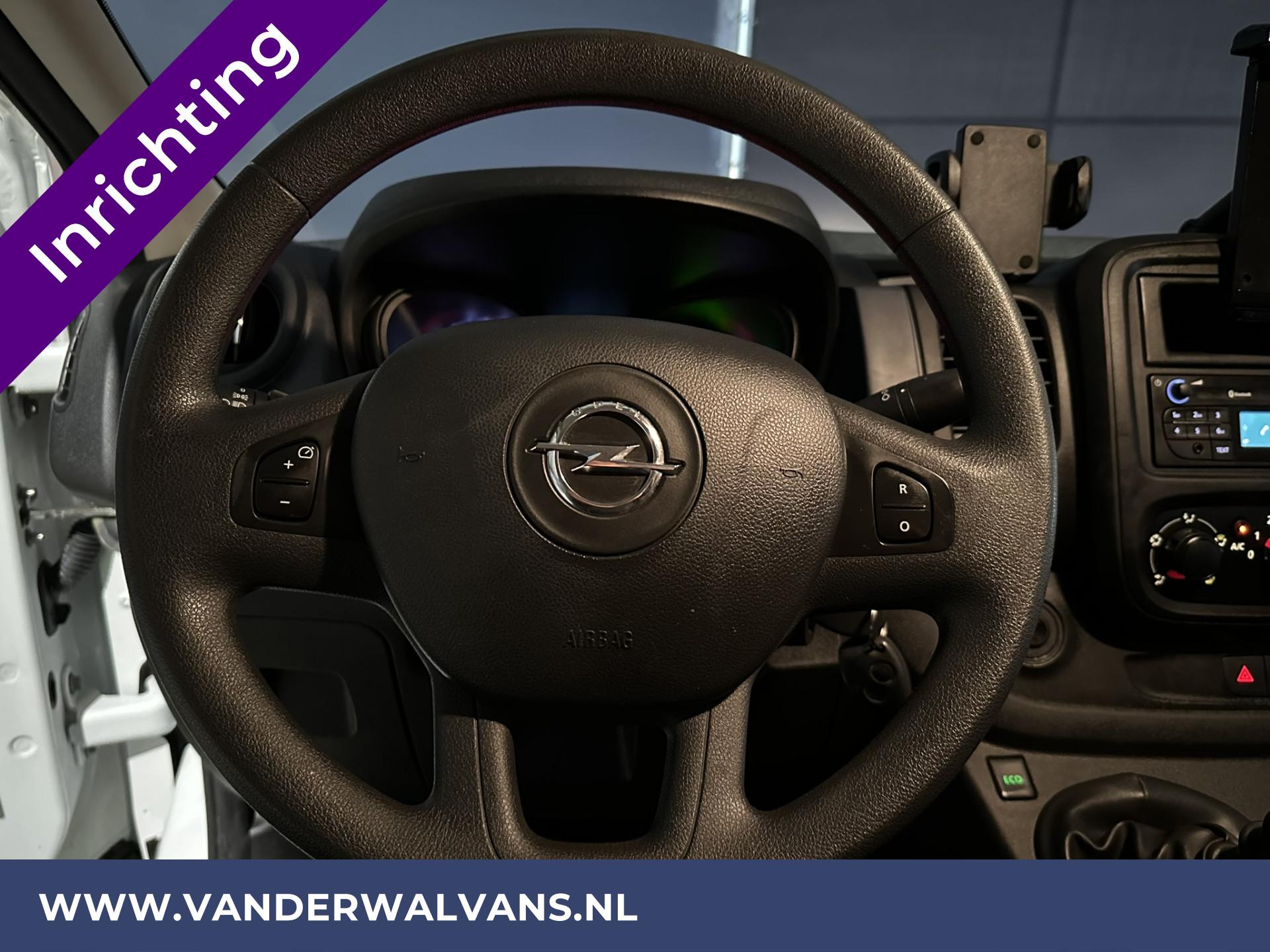 Foto 5 van Opel Vivaro 1.6 CDTI L2H1 Euro6 Airco | Imperiaal | Trekhaak | Inrichting